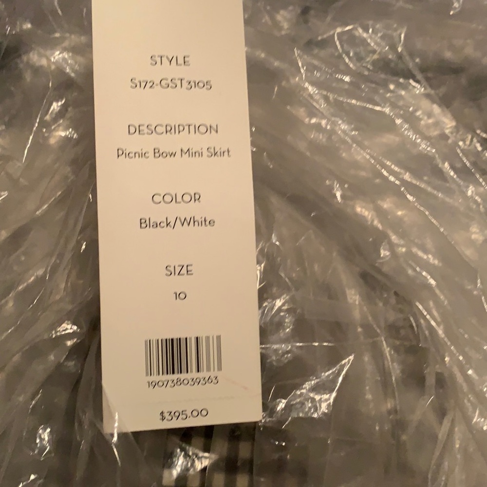 I am selling a brand new Veronica beard skirt black and white size 10 price 257